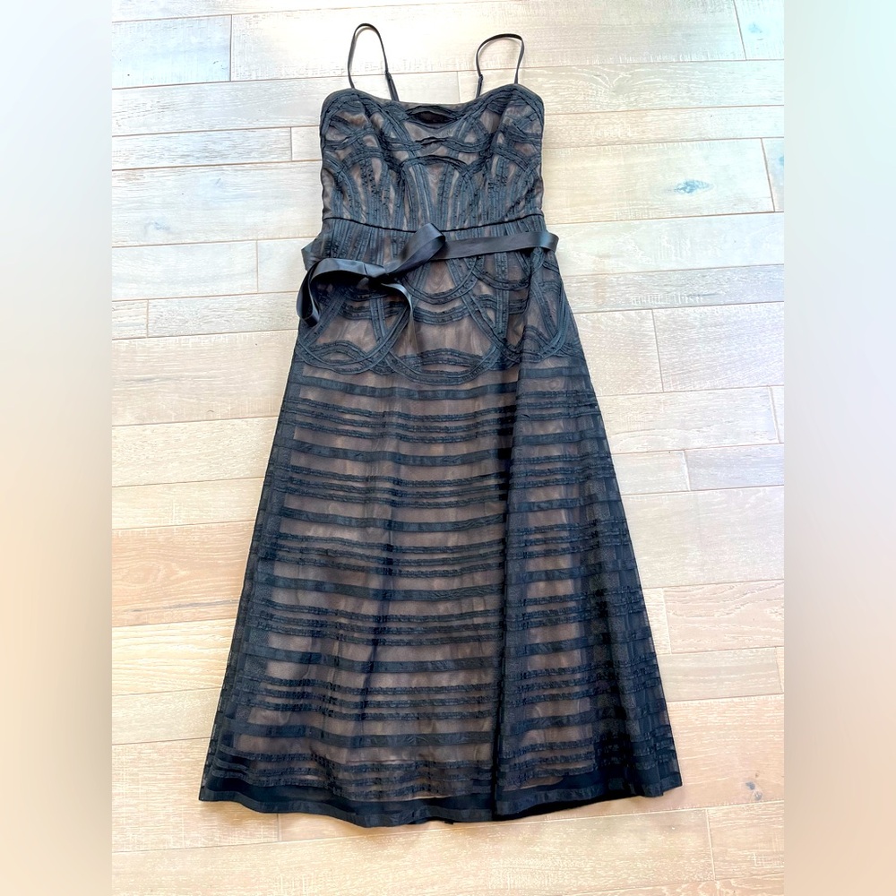 BCBG Maxazria cocktail dress.  Fit and flare dress with layered detailed fabric.
